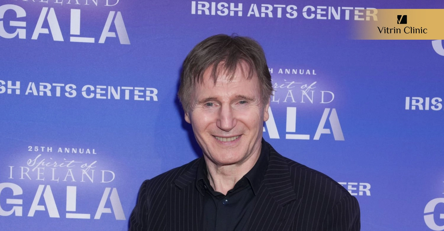 Is Liam Neeson Sporting a Hollywood Smile?